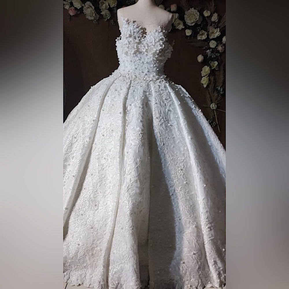 Wedding gown dress, princess a line beaded with pearls.